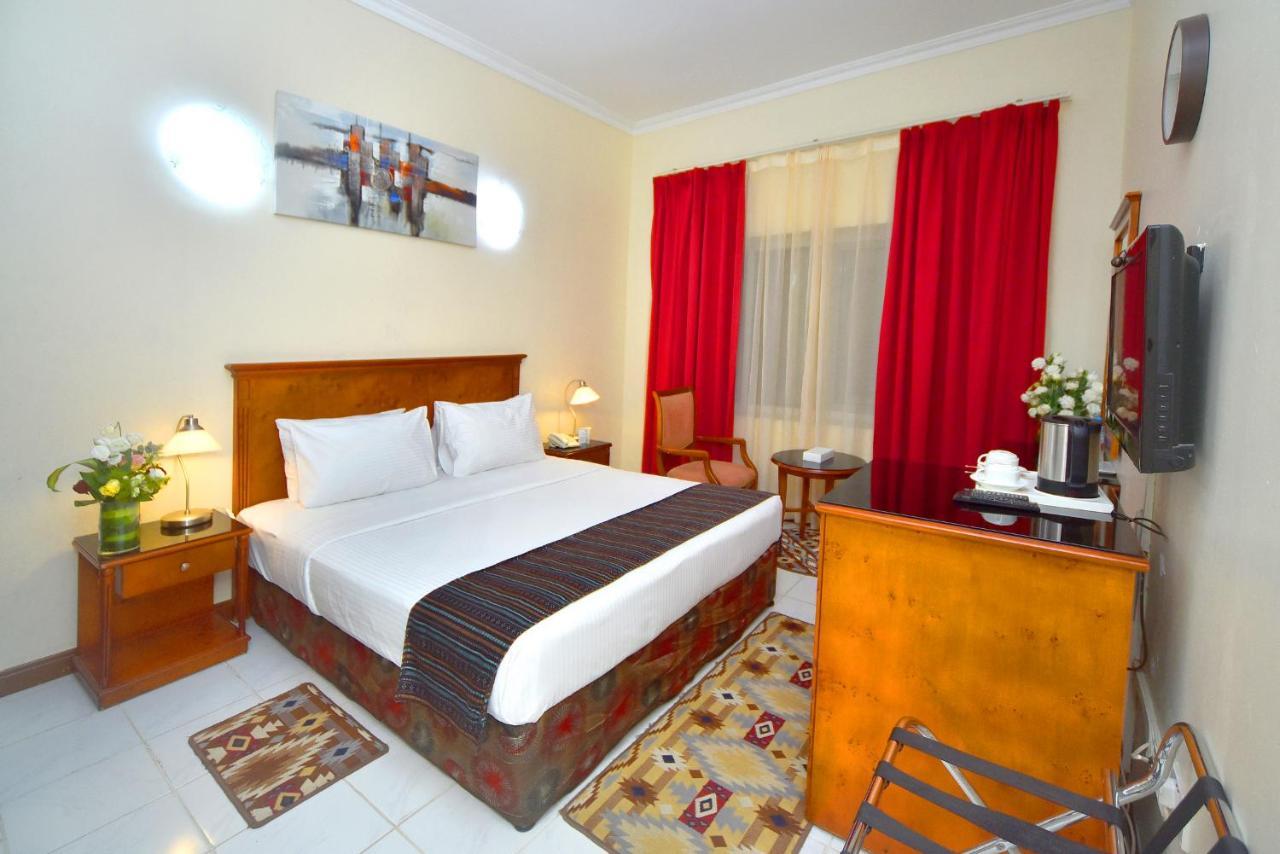 Hotel Nejoum Al Emarat Schardscha Exterior foto